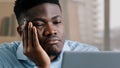 Bored disappointed african man american male businessman have sleeping problem lazy young exhausted guy slumber rest at Royalty Free Stock Photo