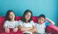 Bored family fell a sitting on sofa at home Royalty Free Stock Photo