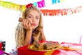 Bored gesture blond kid girl in party with puppy Royalty Free Stock Photo