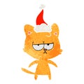 bored hand drawn retro cartoon of a cat wearing santa hat