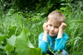 Bored little boy on walk