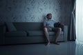 Bored Man sitting on sofa at Quarantine Royalty Free Stock Photo