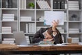 Bored at office work funny sleepy woman worker resting on hand sleeping at workplace, unmotivated lazy woman feeling Royalty Free Stock Photo