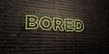 BORED -Realistic Neon Sign on Brick Wall background - 3D rendered royalty free stock image