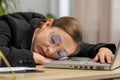 Bored sleepy business woman worker working on laptop computer, yawning falling asleep at home office Royalty Free Stock Photo