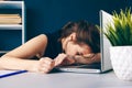 Bored sleepy woman tired. Office worker sleeping at her desk. Royalty Free Stock Photo