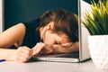 Bored sleepy woman tired. Office worker sleeping at her desk. Royalty Free Stock Photo