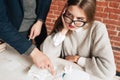 Bored student rolling her eyes at study Royalty Free Stock Photo