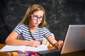 Bored girl doing homework at home Royalty Free Stock Photo