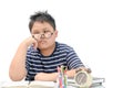 Bored and tired asian student doing homework Royalty Free Stock Photo