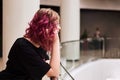 Bored woman in airport wait for landing. girl in shopping mall waiting for parents Royalty Free Stock Photo