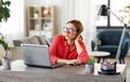 Bored woman with laptop working at home office Royalty Free Stock Photo