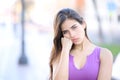 Bored woman looking at camera in the street Royalty Free Stock Photo