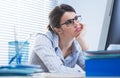 Bored woman at office Royalty Free Stock Photo