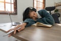 Bored young asian girl student studying, looking upset at laptop screen, attend boring online classes or lecture. Tired Royalty Free Stock Photo