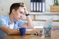 Bored young worker man Royalty Free Stock Photo