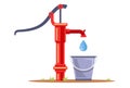 borehole pump pumps water into a bucket. collect drinking water.