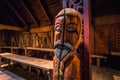 Borg - June 15, 2018: Wooden statue of Odin Inside the Longhouse in the Lofotr Viking Museum at the town of Borg in the Lofoten