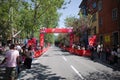 People stand along street waiting for peloton of cyclists of Giro d`Italia