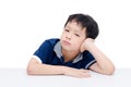 Boring boy sitting over white Royalty Free Stock Photo