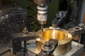 The boring operation the brass part with NC milling machine Royalty Free Stock Photo