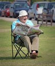 Boring sunday newspaper read Royalty Free Stock Photo