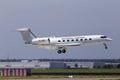 TR-KGM Republic Gabon Gulfstream Aerospace G650-ER aircraft landing on the runway Royalty Free Stock Photo