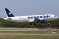 TS-INQ Nouvelair Tunisie Airbus A320-200 aircraft landing on the runway