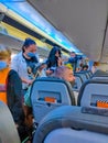 Borispol, Ukraine - September 6, 2020: The passengers wearing masks on airline flight at Borispol, Ukraine