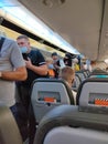Borispol, Ukraine - September 6, 2020: The passengers wearing masks on airline flight at Borispol, Ukraine