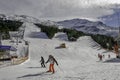 Bormio, Italy - January 31, 2005: Ski slope in Bormio with skier Royalty Free Stock Photo