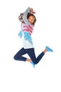 Born to have fun. Studio shot of a young girl jumping for joy against a white background. Royalty Free Stock Photo