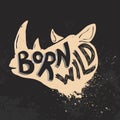 Born wild. Rhino head on grunge background.