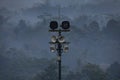 A pole with speakers and light bulbs for prayers, in the Borobudur temple Royalty Free Stock Photo