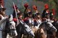 Reenactors cuirassiers ride horses at Borodino battle historical reenactment in Russia Royalty Free Stock Photo