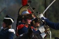 Reenactors cuirassiers ride horses at Borodino battle historical reenactment in Russia