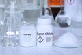 Boron nitride in container, chemical analysis in laboratory