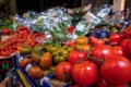 Borough Market, in Southwark, east London UK. Variety of tomatoes for sale in the foreground. Royalty Free Stock Photo