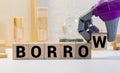 BORROW word on wood blocks concept Royalty Free Stock Photo