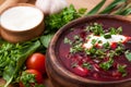 Borsch in a wooden plate