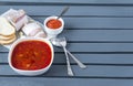 borscht plate, bread, bacon, bacon, spoon, fork ,garlic, ketchup