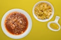 Borscht soup on a colored background. Borscht soup with sour cream and with vegetable salad. healthy lunch top view Royalty Free Stock Photo