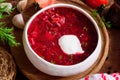 Borscht soup in white bowl with sour cream Royalty Free Stock Photo