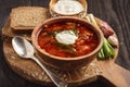 Borscht - traditional russian and ukrainian beetroot soup on wooden background. Royalty Free Stock Photo