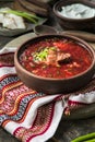 Borscht - Traditional Ukrainian dish. Vegetable soup made from beets, potatoes, cereals and boiled meat, and slices of rye bread