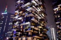 Bosco Verticale, vertical forest, modern condo with trees growing on balconies, sustainable architecture, night view