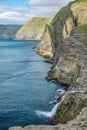 Bosdalafossur waterfall vertical composition in Faroe Islands Royalty Free Stock Photo