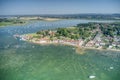 Bosham Village with boats moored in the estuary aerial.