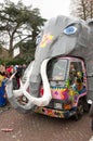 Papier mache elephant on a purple colored Mitsubishi van during the carnival parade in