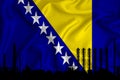 Bosnia and herzegovina flag, background with space for your logo - industrial 3D illustration.Silhouette of a chemical plant, oil